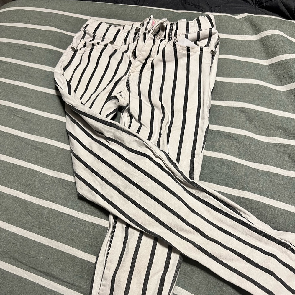 Girls black and white striped skinny jeans